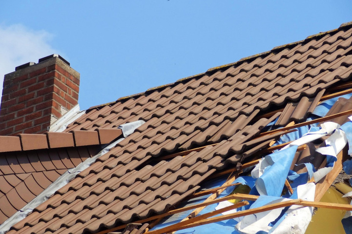 roofers installing shingles